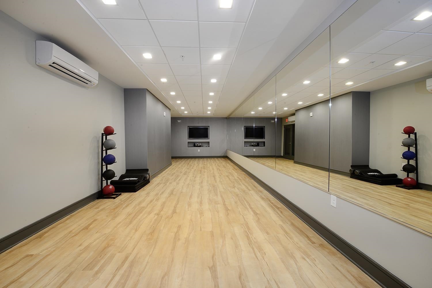 1450 Washington Street, Unit 608 Hoboken, NJ 07030 - Photo 31 of 44 a view of a hall with wooden floor