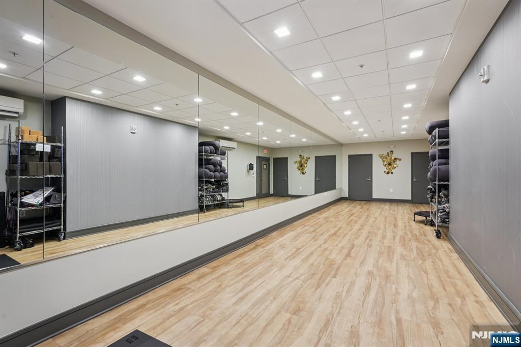 1450 Washington Street, Unit 608 Hoboken, NJ 07030 - Photo 33 of 44 a view of an empty room with wooden floor