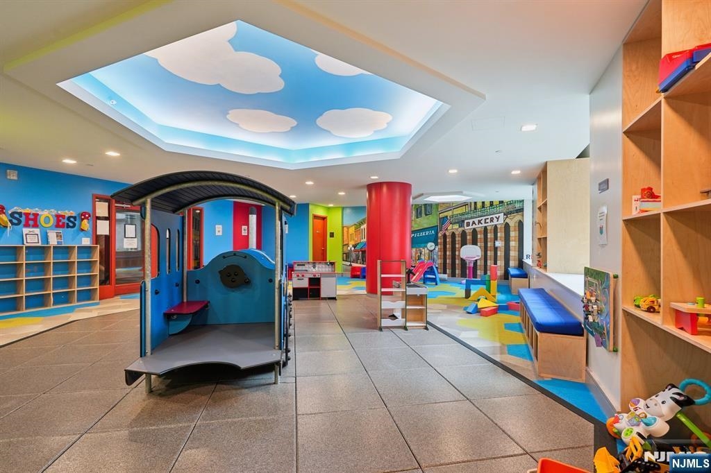 1450 Washington Street, Unit 608 Hoboken, NJ 07030 - Photo 39 of 44 a living room with furniture and lots of furniture