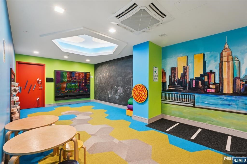 1450 Washington Street, Unit 608 Hoboken, NJ 07030 - Photo 40 of 44 a view of a room with gym equipment