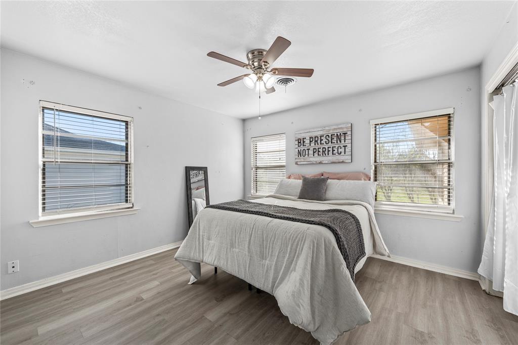901 North Main Street West, TX 76691 - Photo 17 of 32 a bedroom with a bed and a window