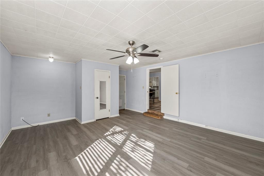 901 North Main Street West, TX 76691 - Photo 24 of 32 a view of an empty room with wooden floor