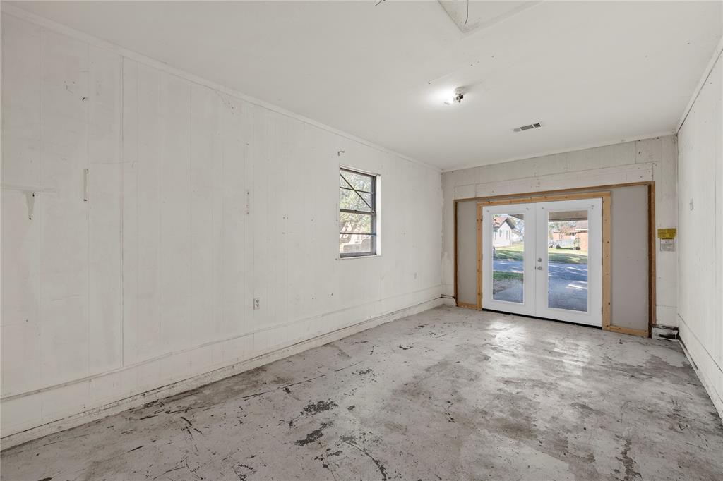 901 North Main Street West, TX 76691 - Photo 26 of 32 an empty room with windows