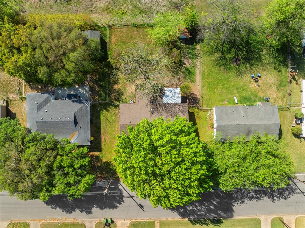901 North Main Street West, TX 76691 - Photo 31 of 32 an aerial view of a house with a yard