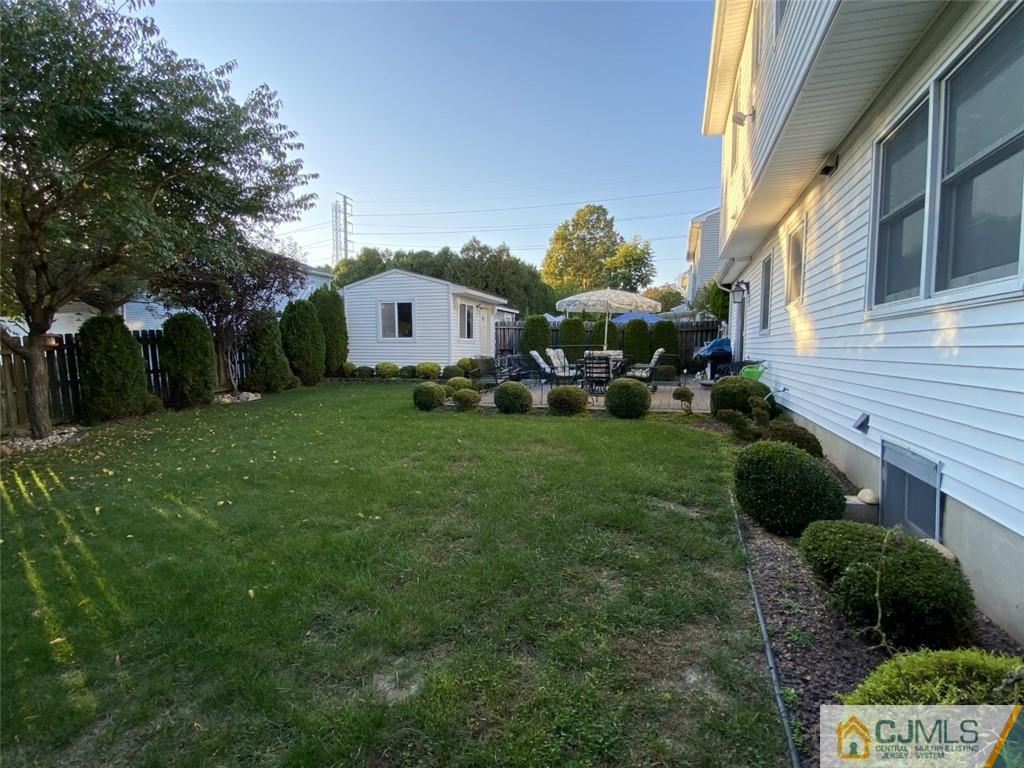 58 Brookside Road Edison, NJ 08817 - Photo 28 of 34 a view of a yard in front of a house
