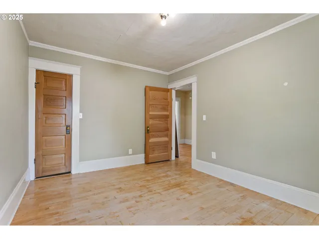 an empty room with closet and closet