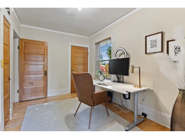 a workspace with furniture and window