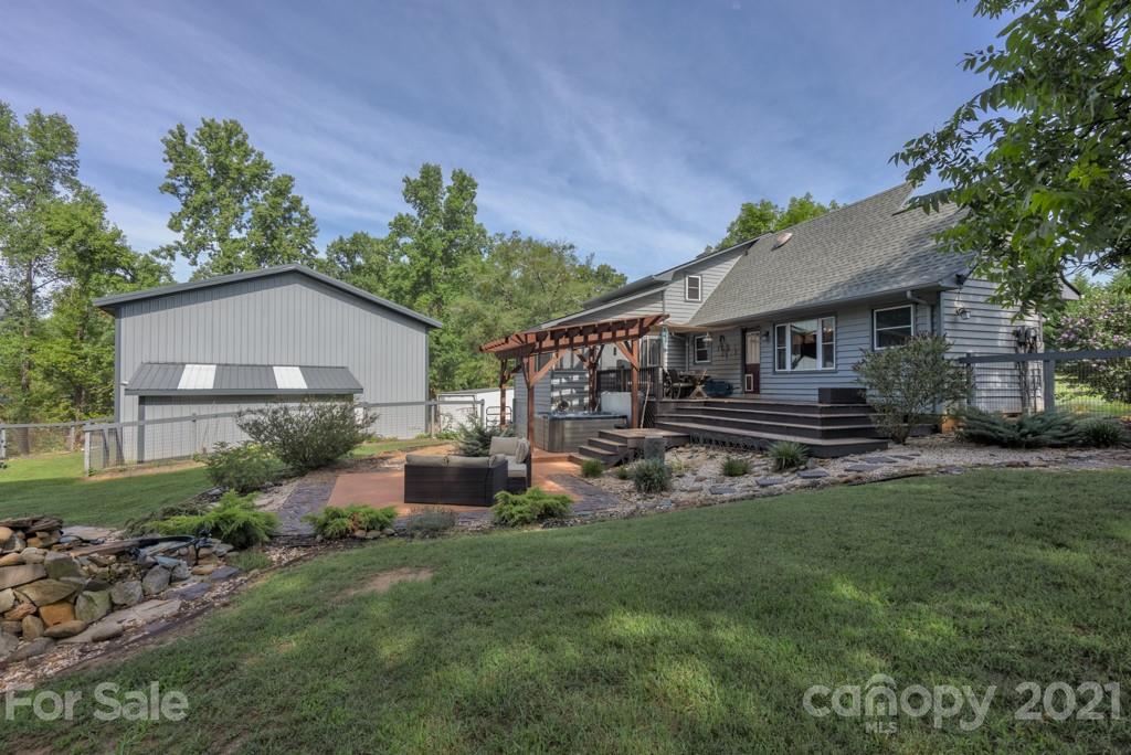 125 Mountainview Road Landrum, SC 29356 - Photo 1 of 48 a front view of house with yard and green space