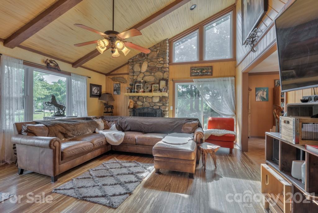 125 Mountainview Road Landrum, SC 29356 - Photo 11 of 48 a living room with furniture and a large window