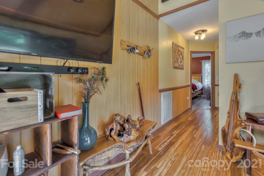 125 Mountainview Road Landrum, SC 29356 - Photo 15 of 48 a view of a room with wooden floor