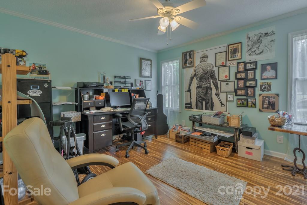 125 Mountainview Road Landrum, SC 29356 - Photo 20 of 48 a living room with furniture and wooden floor