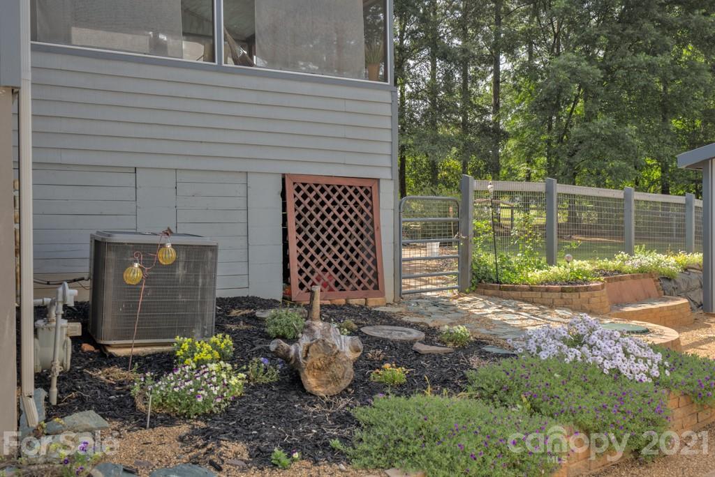 125 Mountainview Road Landrum, SC 29356 - Photo 28 of 48 a backyard of a house with lots of green space