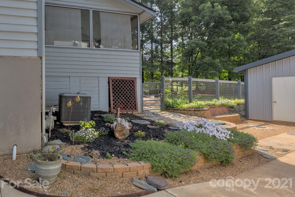 125 Mountainview Road Landrum, SC 29356 - Photo 29 of 48 a backyard of a house with lots of green space