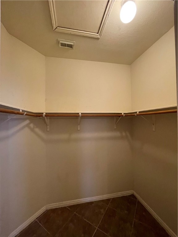 1881 Dapplegrey Lane Austin, TX 78727 - Photo 14 of 28 a view of a room with racks on the wall