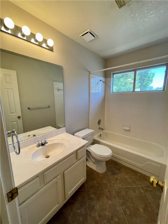 1881 Dapplegrey Lane Austin, TX 78727 - Photo 22 of 28 a bathroom with a sink a toilet and mirror