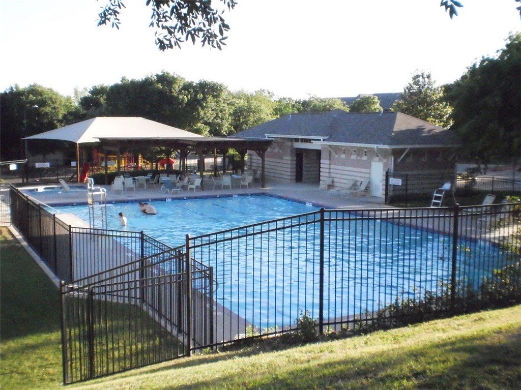 1881 Dapplegrey Lane Austin, TX 78727 - Photo 25 of 28 a view of a house with backyard and sitting area