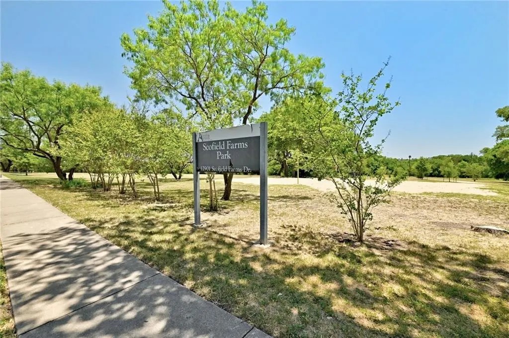 1881 Dapplegrey Lane Austin, TX 78727 - Photo 28 of 28 a sign board with lake view