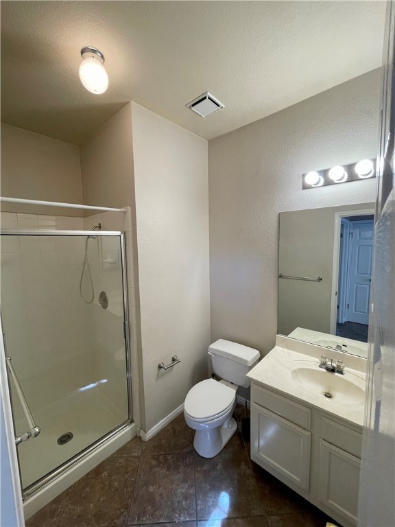 1881 Dapplegrey Lane Austin, TX 78727 - Photo 4 of 28 a bathroom with a sink a toilet and shower