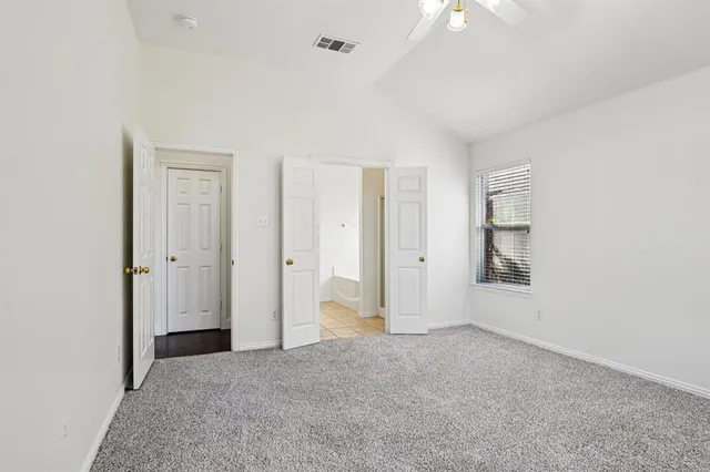 a bathroom with a sink vanity and a mirror