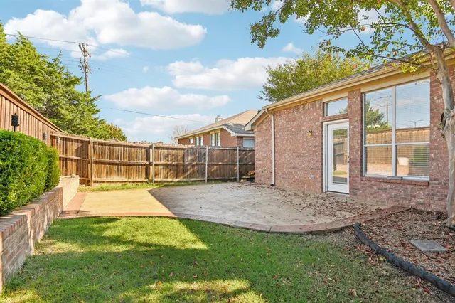 a view of backyard with green space