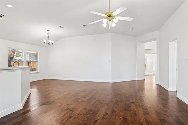 a view of kitchen with wooden floor