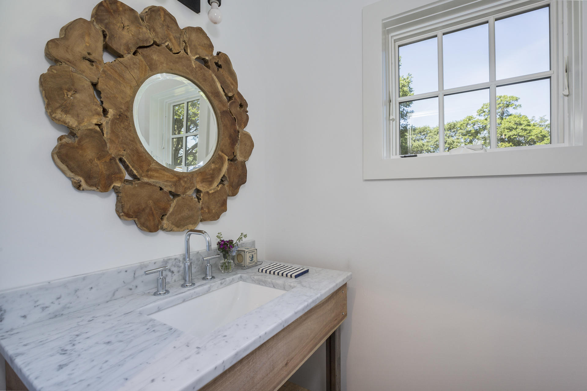 8 Walmsley Road Darien, CT 06820 - Photo 13 of 28 a bathroom with a sink and a mirror