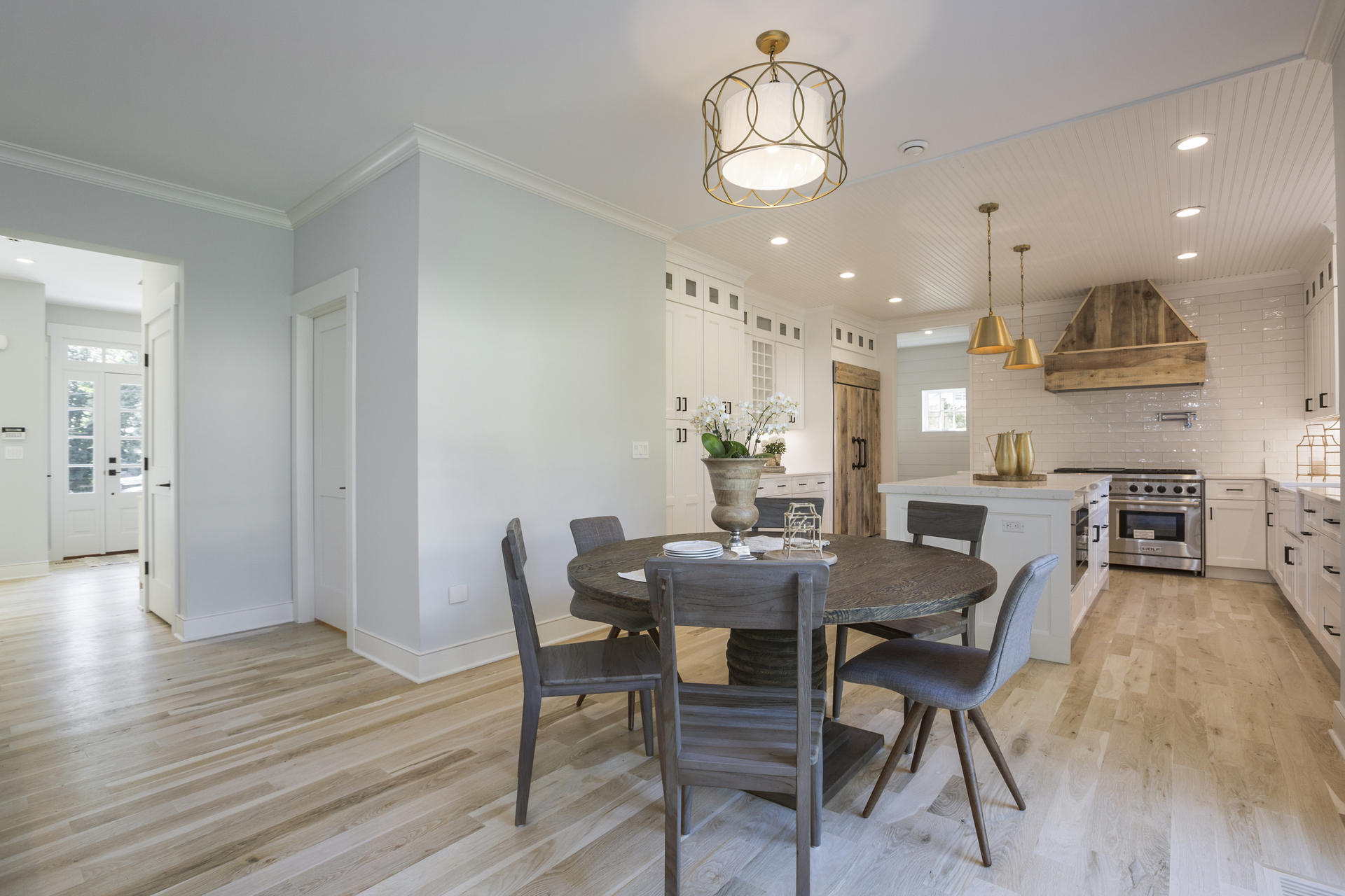 8 Walmsley Road Darien, CT 06820 - Photo 5 of 28 a view of a dining room with furniture and wooden floor