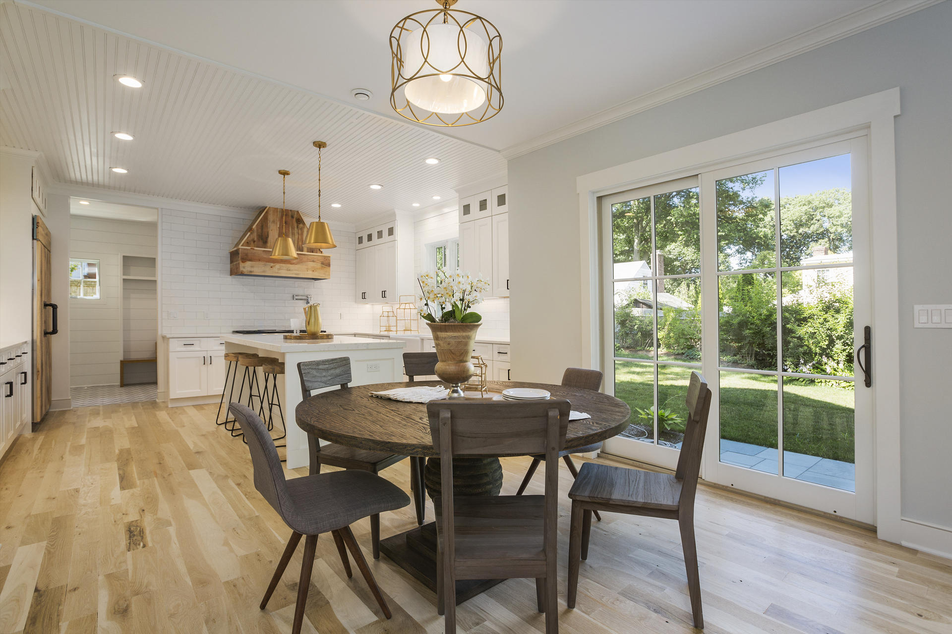 8 Walmsley Road Darien, CT 06820 - Photo 6 of 28 a view of a dining room with furniture window and wooden floor