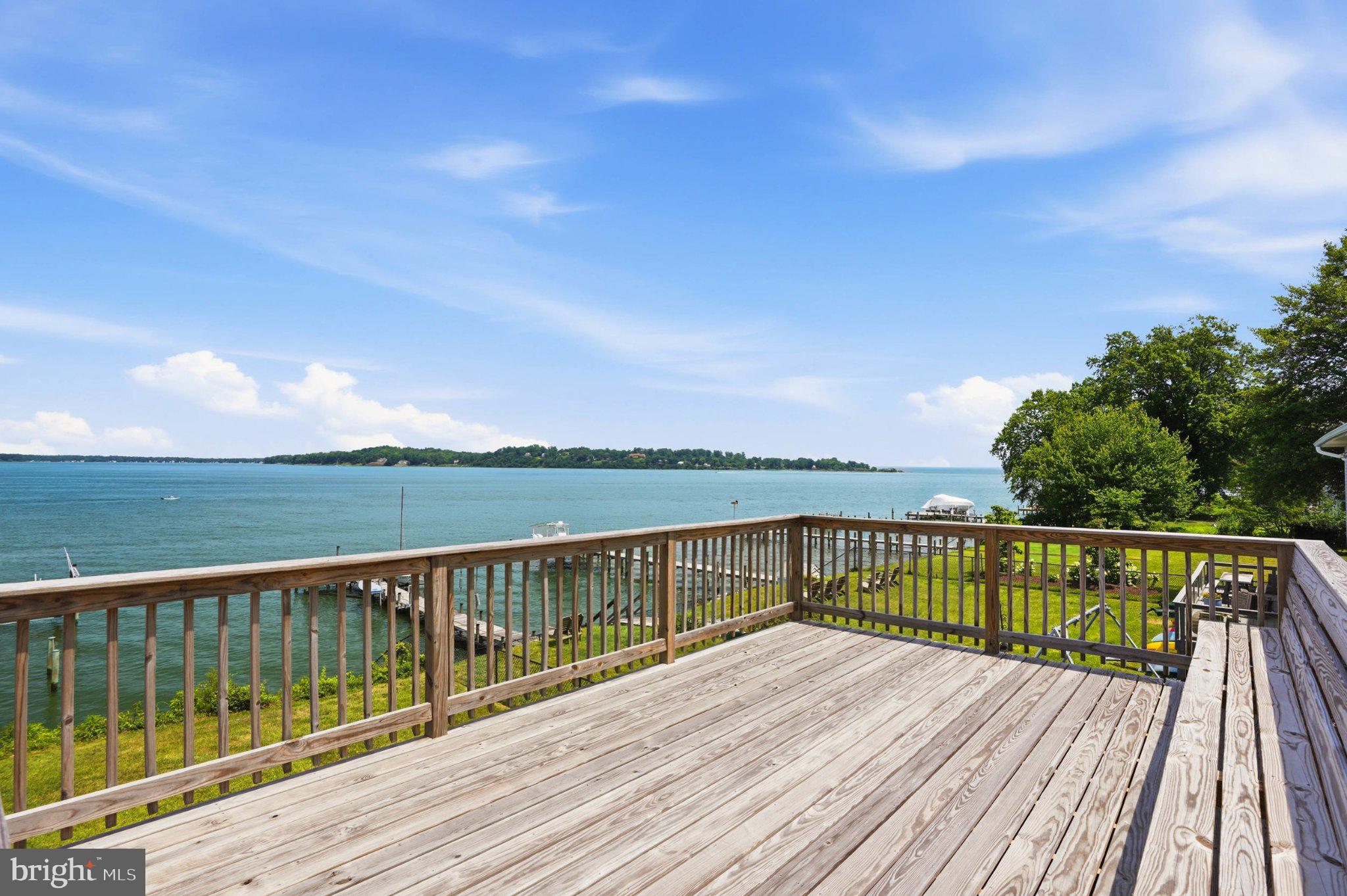 1100 River Bay Road Annapolis, MD 21409 - Photo 43 of 67 a view of balcony with wooden floor and fence
