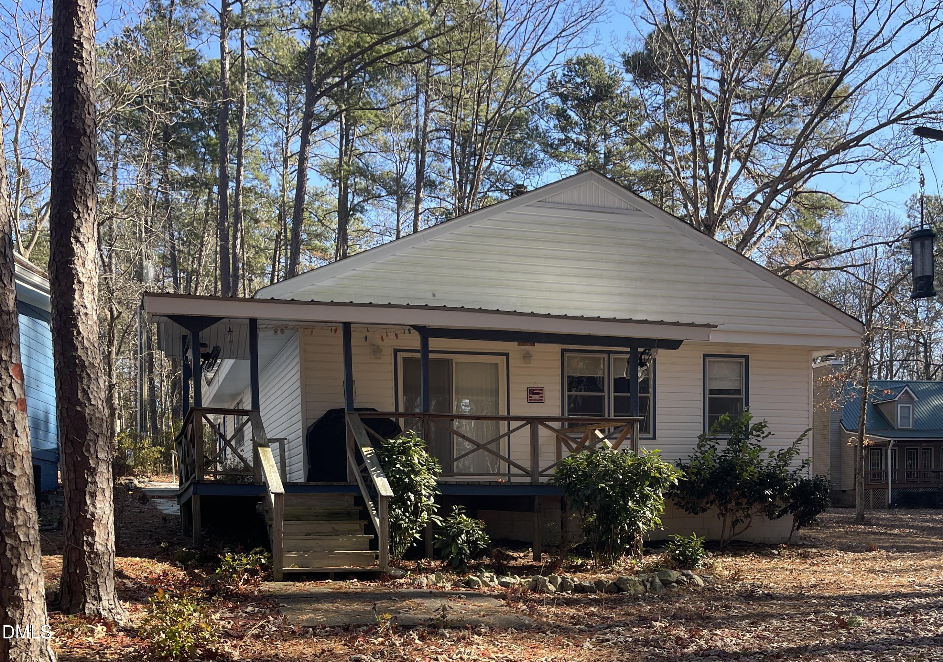 129 Boulder Boulevard Manson, NC 27553 - Photo 2 of 43 a front view of a house with garden