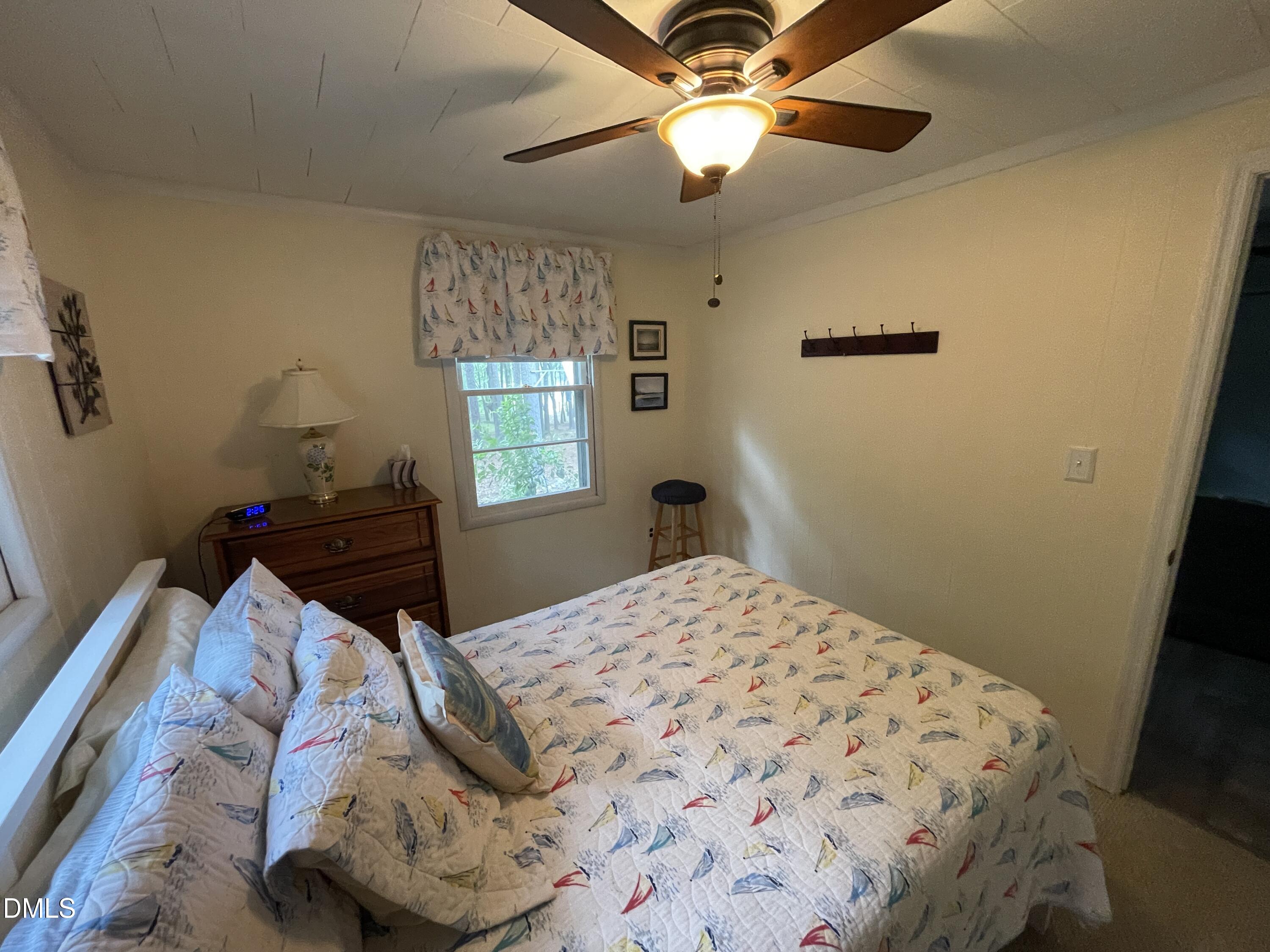 129 Boulder Boulevard Manson, NC 27553 - Photo 28 of 48 a bedroom with a bed and a window