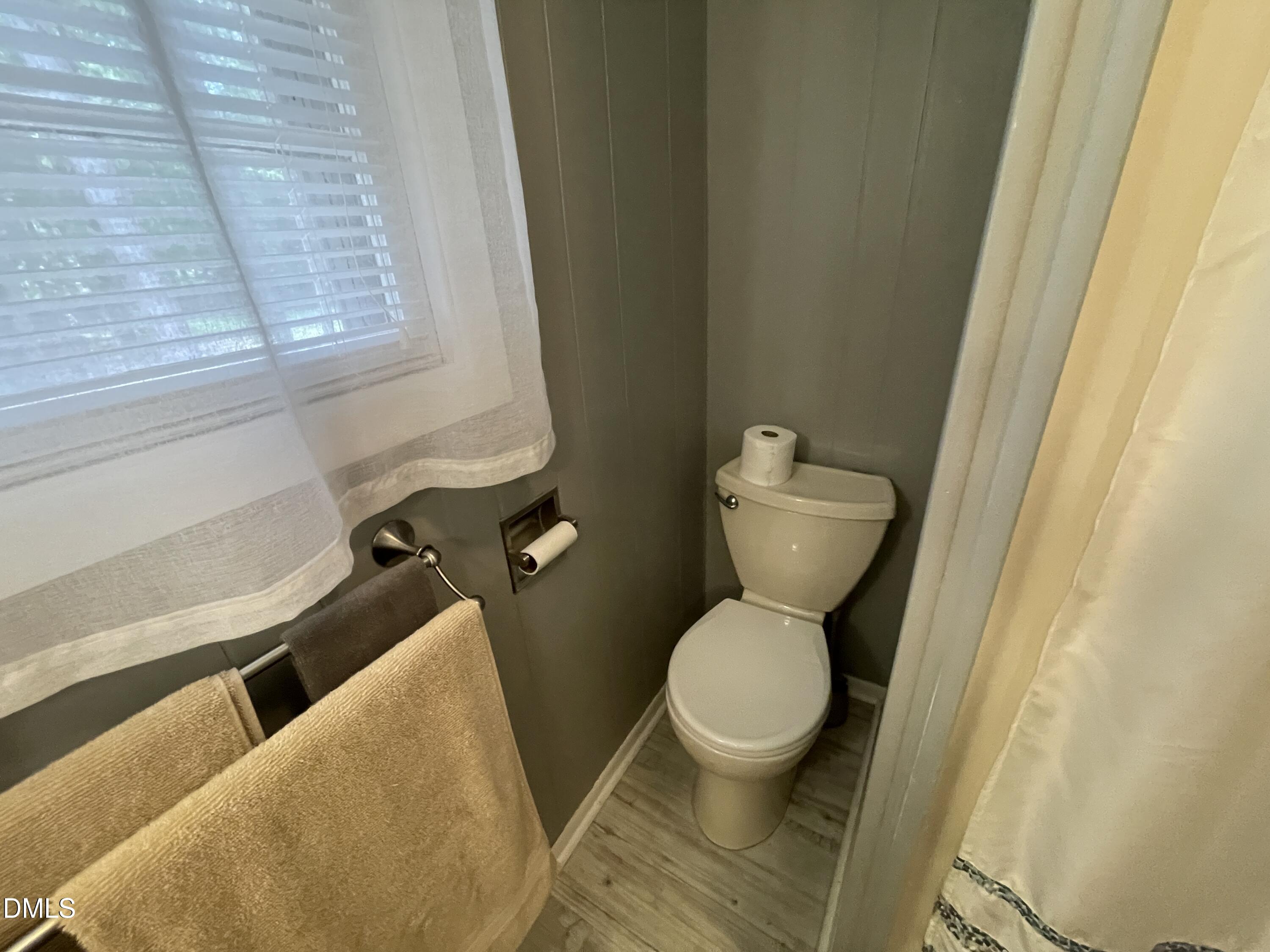 129 Boulder Boulevard Manson, NC 27553 - Photo 30 of 48 a bathroom with a toilet and a sink