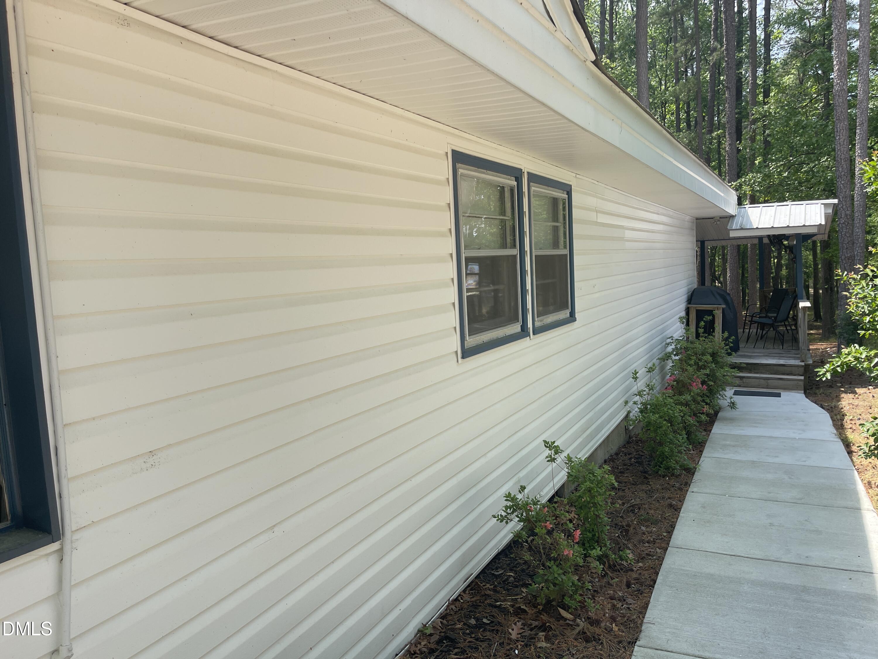 129 Boulder Boulevard Manson, NC 27553 - Photo 3 of 48 a view of a pathway with a house
