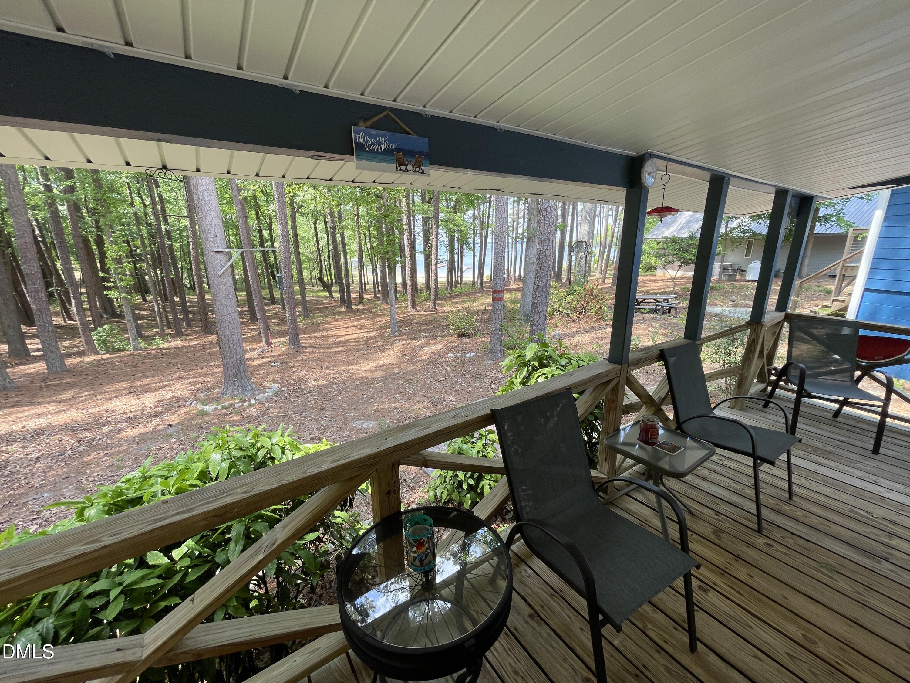 129 Boulder Boulevard Manson, NC 27553 - Photo 36 of 48 a view of a patio with wooden floor