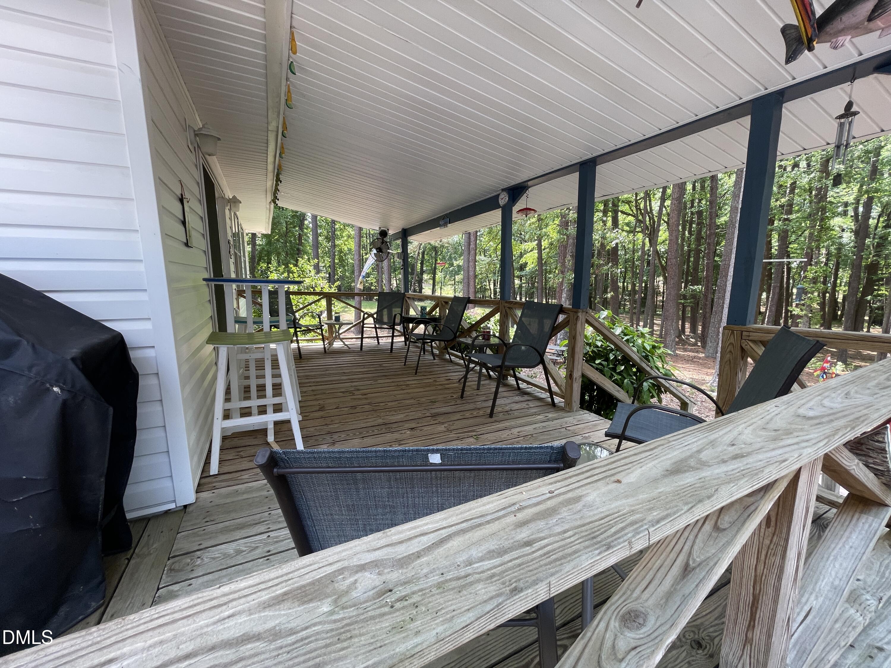 129 Boulder Boulevard Manson, NC 27553 - Photo 37 of 48 a view of a patio with wooden floor