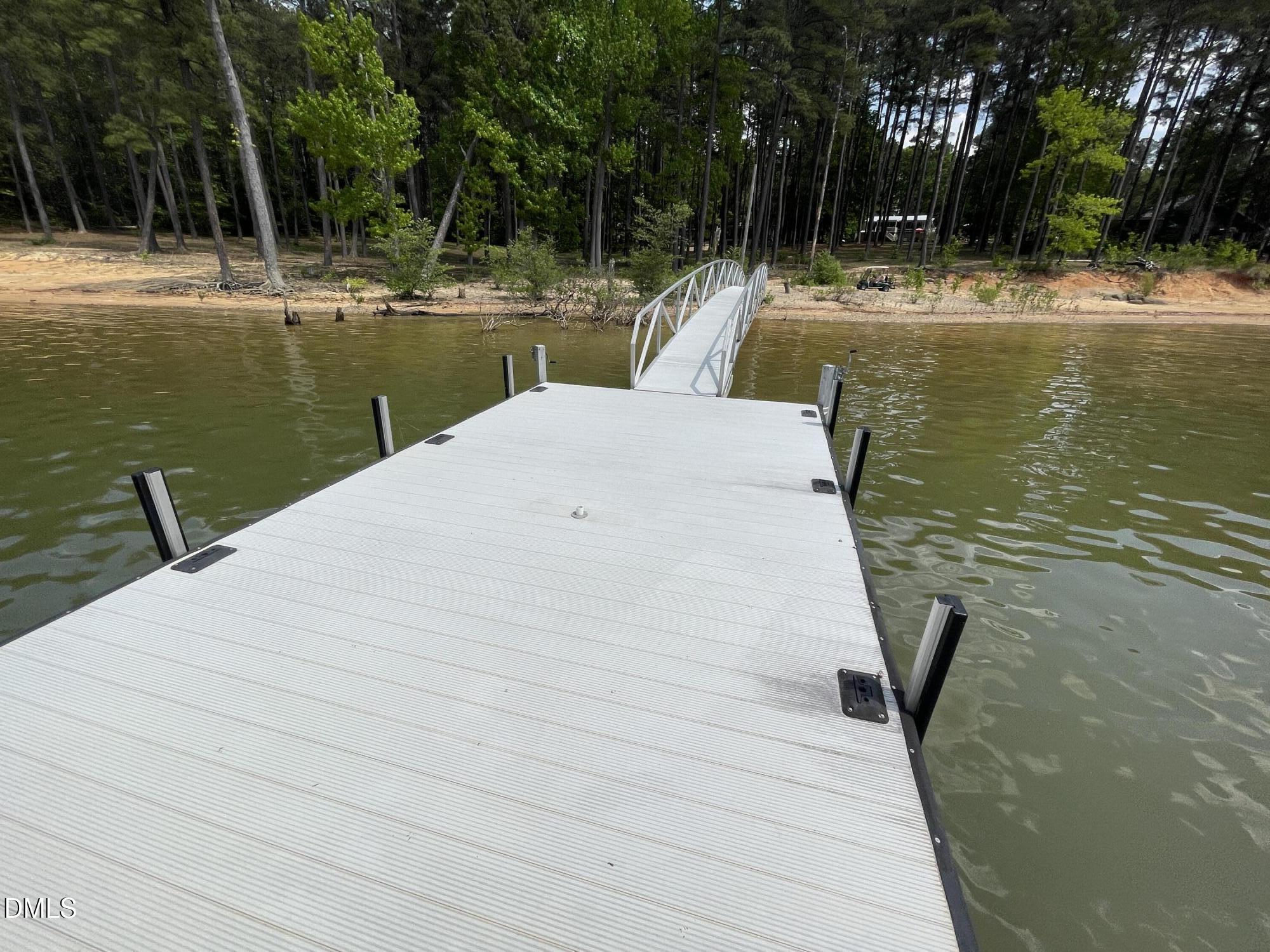 129 Boulder Boulevard Manson, NC 27553 - Photo 44 of 48 a view of a swimming pool with a patio