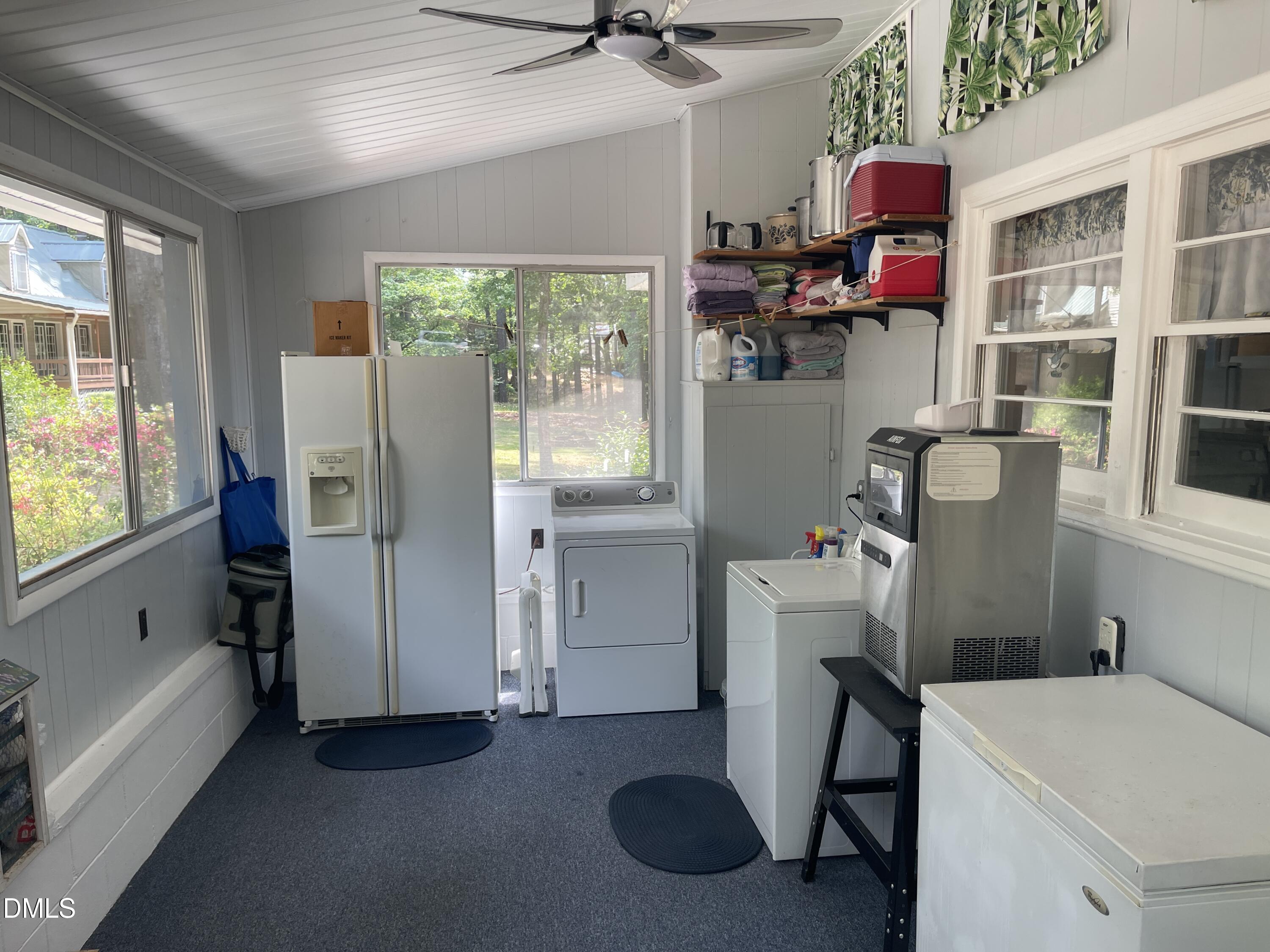 129 Boulder Boulevard Manson, NC 27553 - Photo 9 of 48 a kitchen with refrigerator and window