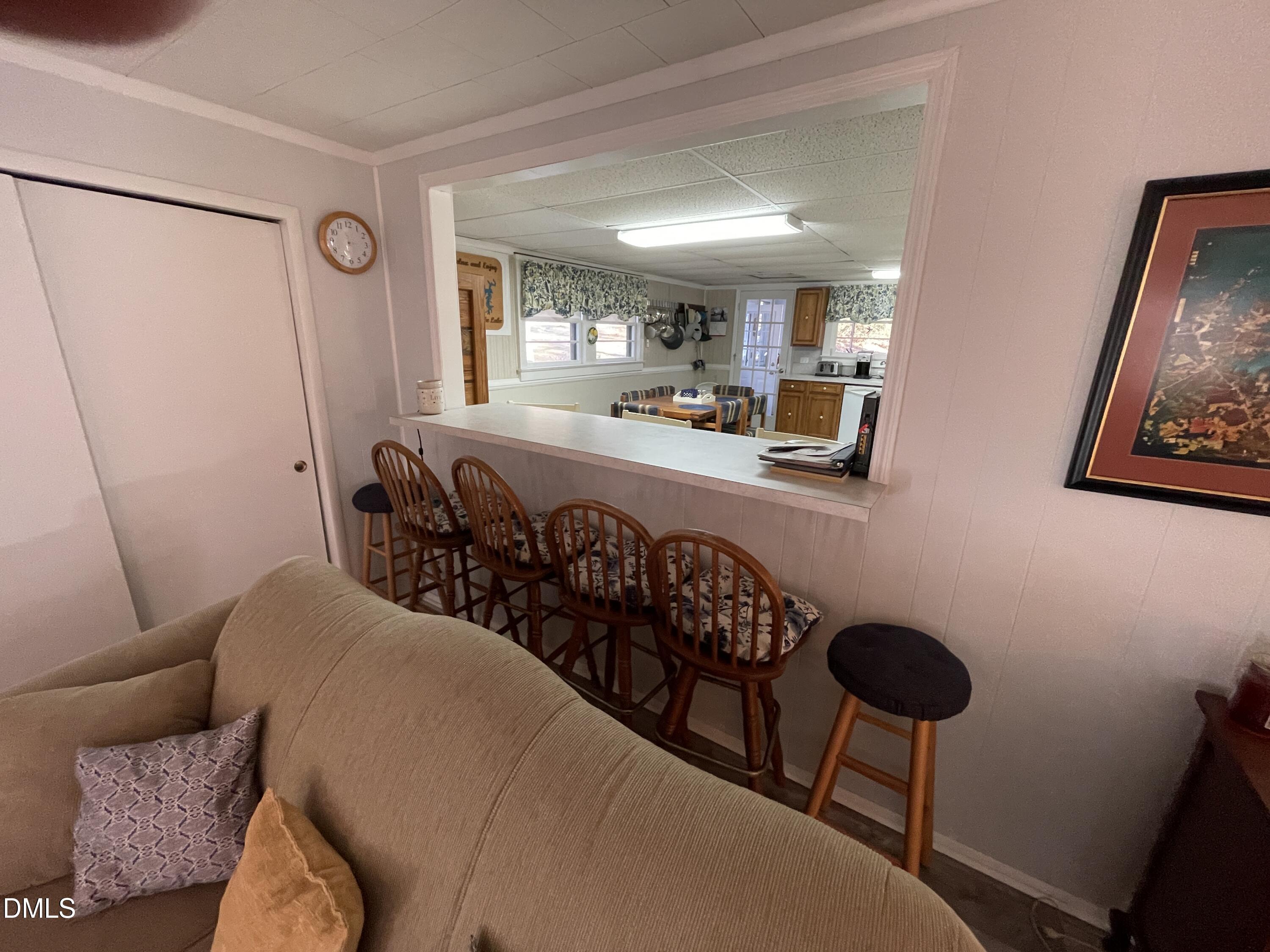 129 Boulder Boulevard Manson, NC 27553 - Photo 10 of 48 a view of a livingroom with furniture and a couch