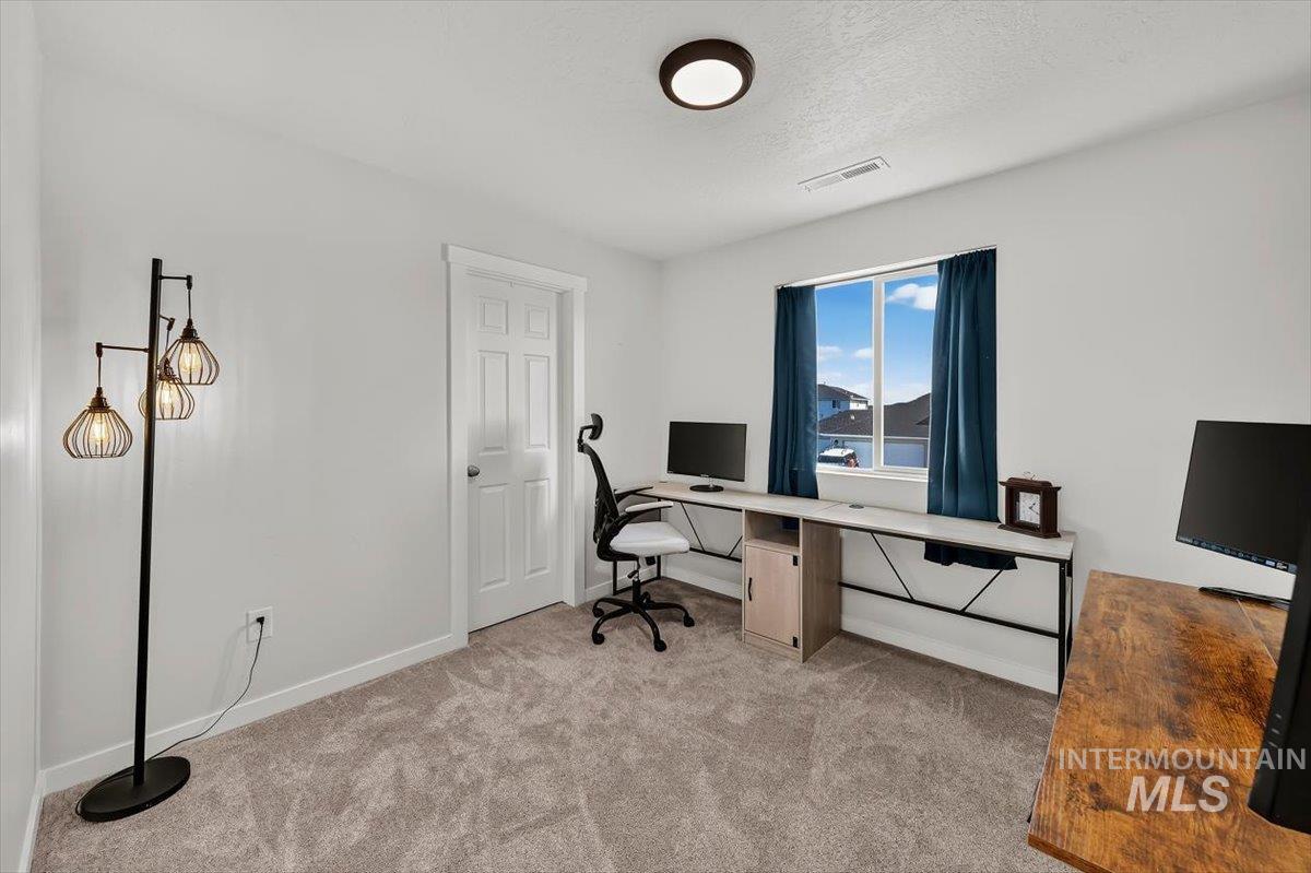 8575 South Foraker Way Kuna, ID 83634 - Photo 29 of 43 Spacious bedroom with large walk-in closet