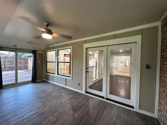 a kitchen with stainless steel appliances granite countertop a sink and a stove