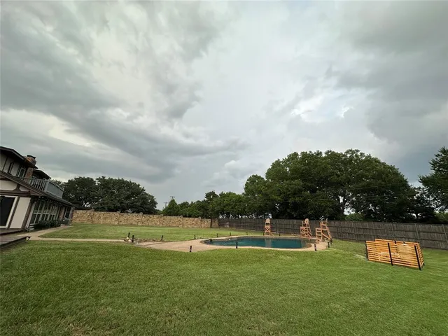 a view of street from balcony