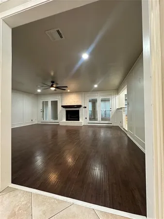 a kitchen with stainless steel appliances a refrigerator sink and cabinets