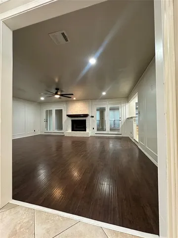 a kitchen with stainless steel appliances a refrigerator sink and cabinets