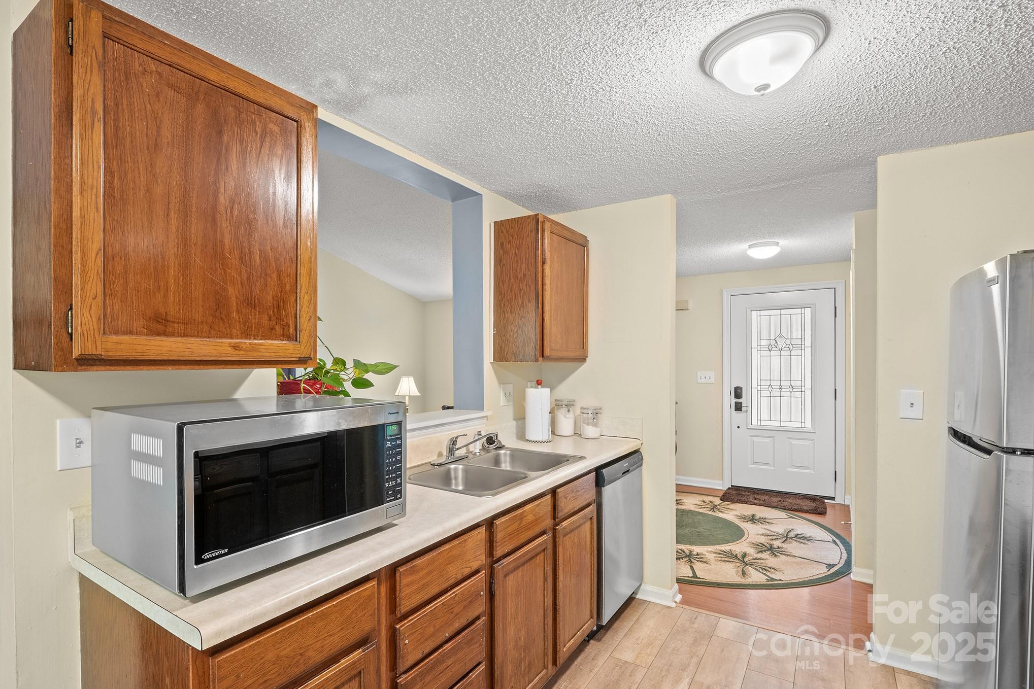 6836 Shiloh Ridge Lane Charlotte, NC 28212 - Photo 12 of 25 a bathroom with a sink and a mirror