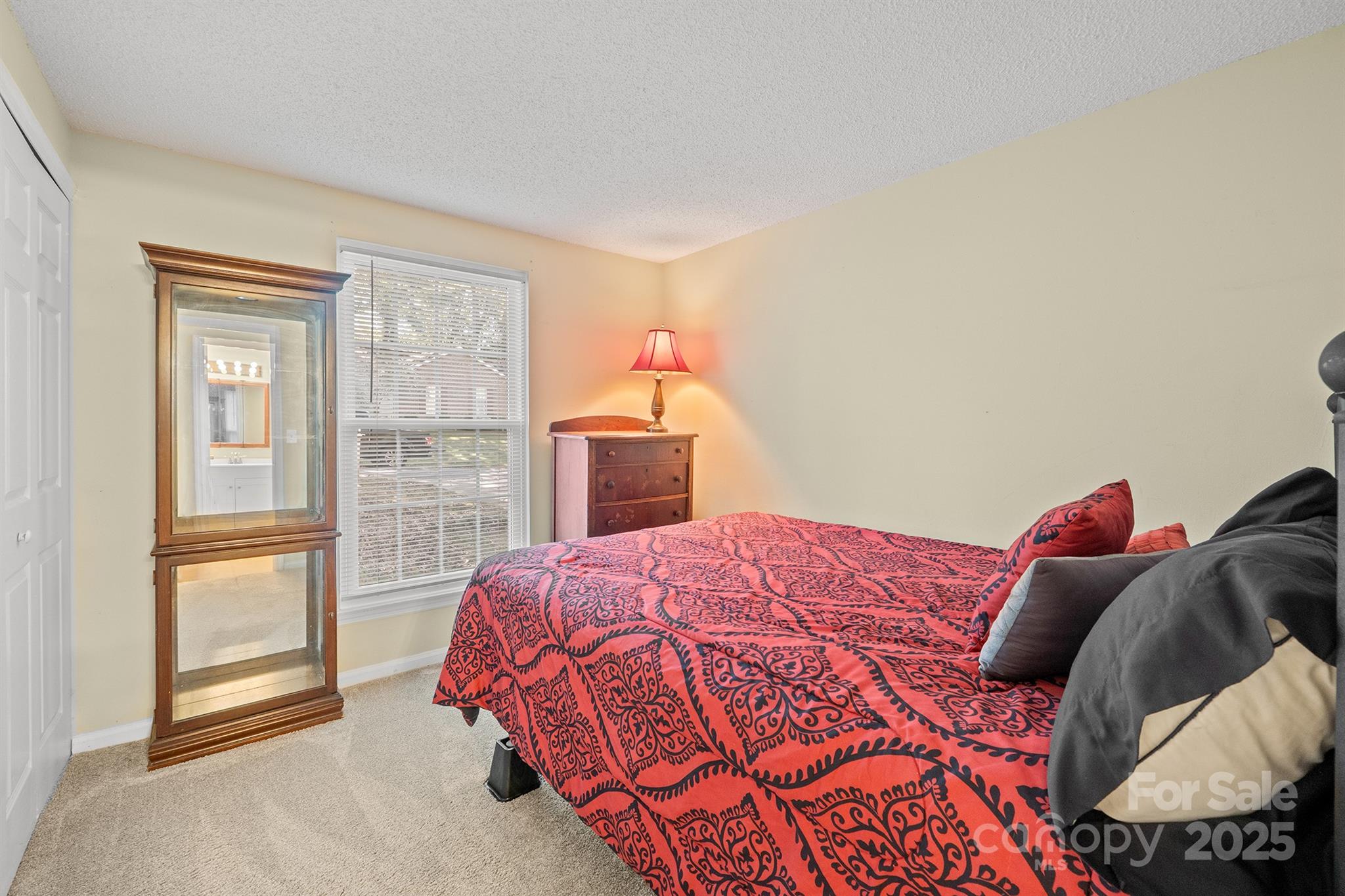 6836 Shiloh Ridge Lane Charlotte, NC 28212 - Photo 21 of 25 a bedroom with a bed and a window