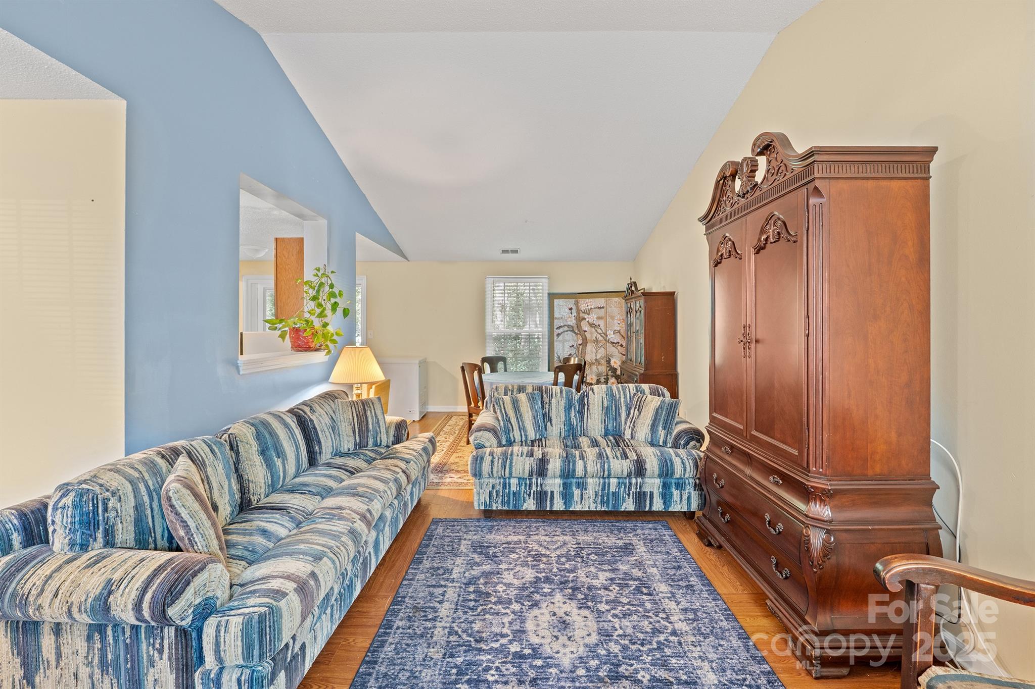 6836 Shiloh Ridge Lane Charlotte, NC 28212 - Photo 6 of 25 a living room with furniture