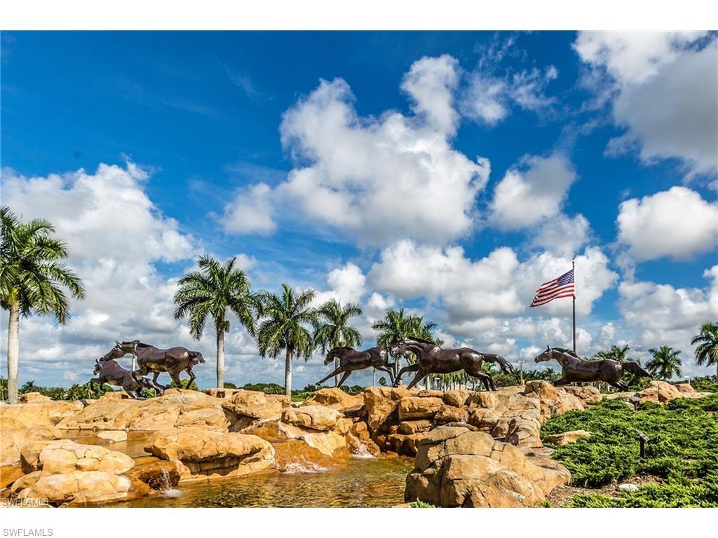 7599 Moorgate Point Way Naples, FL 34113 - Photo 17 of 24 a view of a backyard of the house