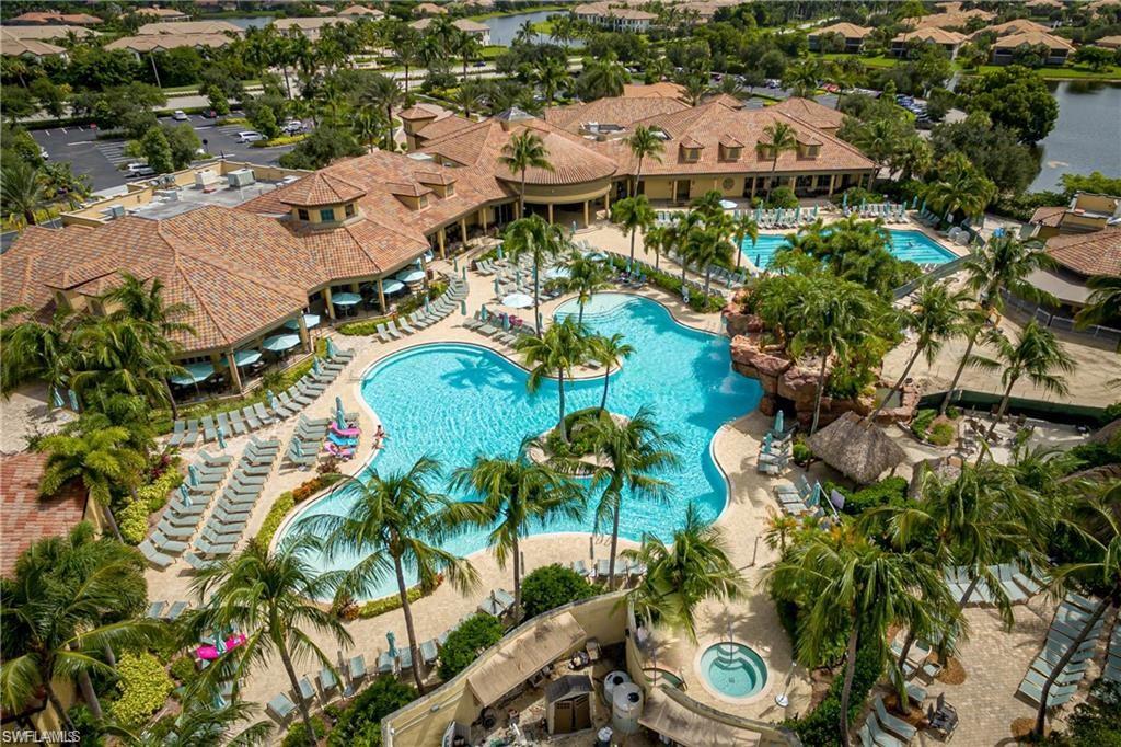 7599 Moorgate Point Way Naples, FL 34113 - Photo 18 of 24 an aerial view of residential houses with outdoor space