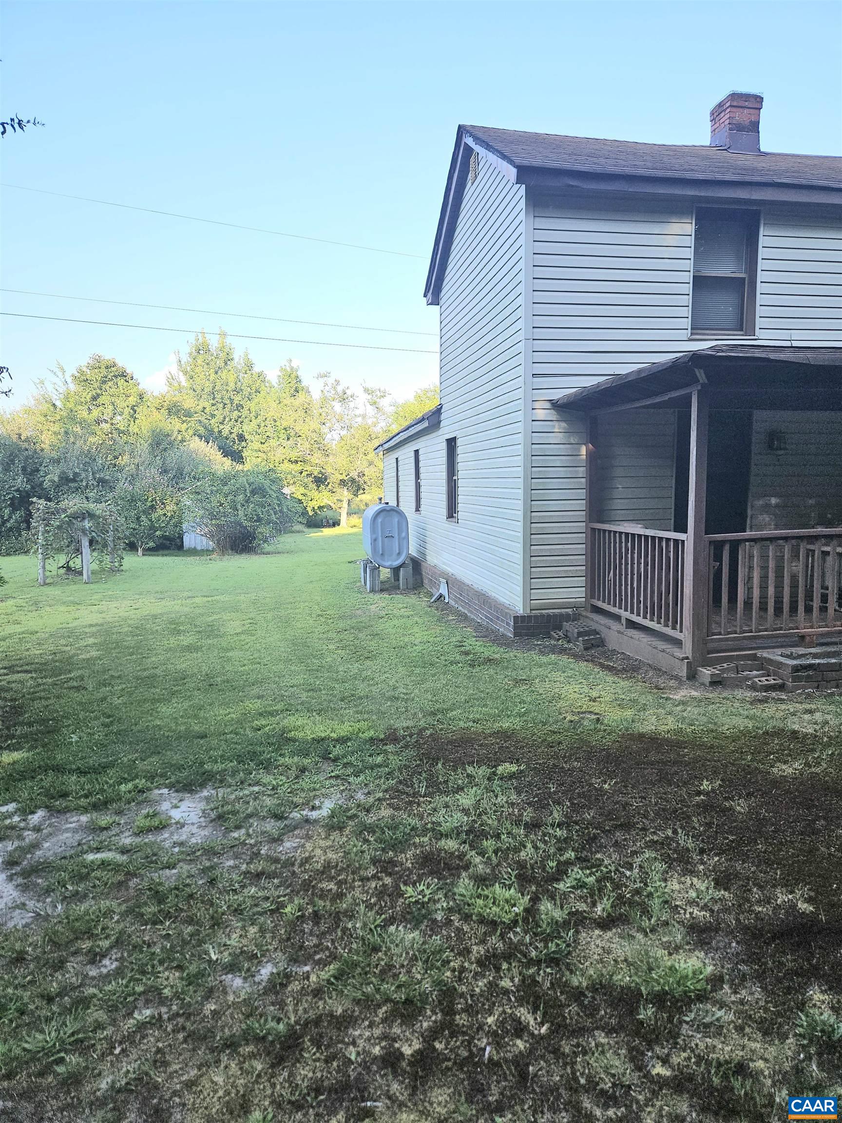 794 Jenkins Church Road Cumberland, VA 23040 - Photo 2 of 7 a view of a house with a yard