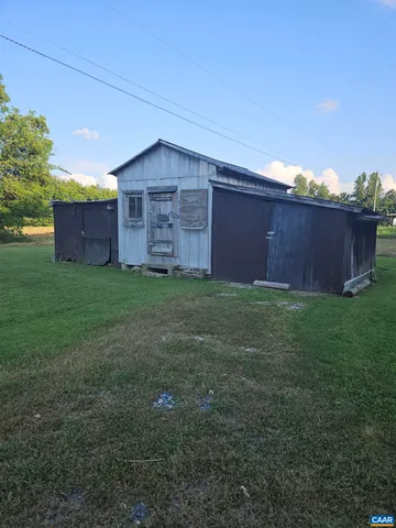 a view of a backyard of the house